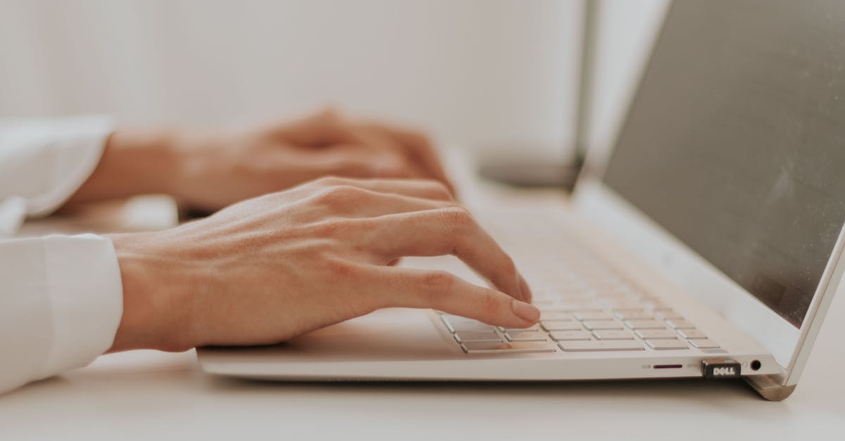 Hands Typing on Laptop · Free Stock Photo